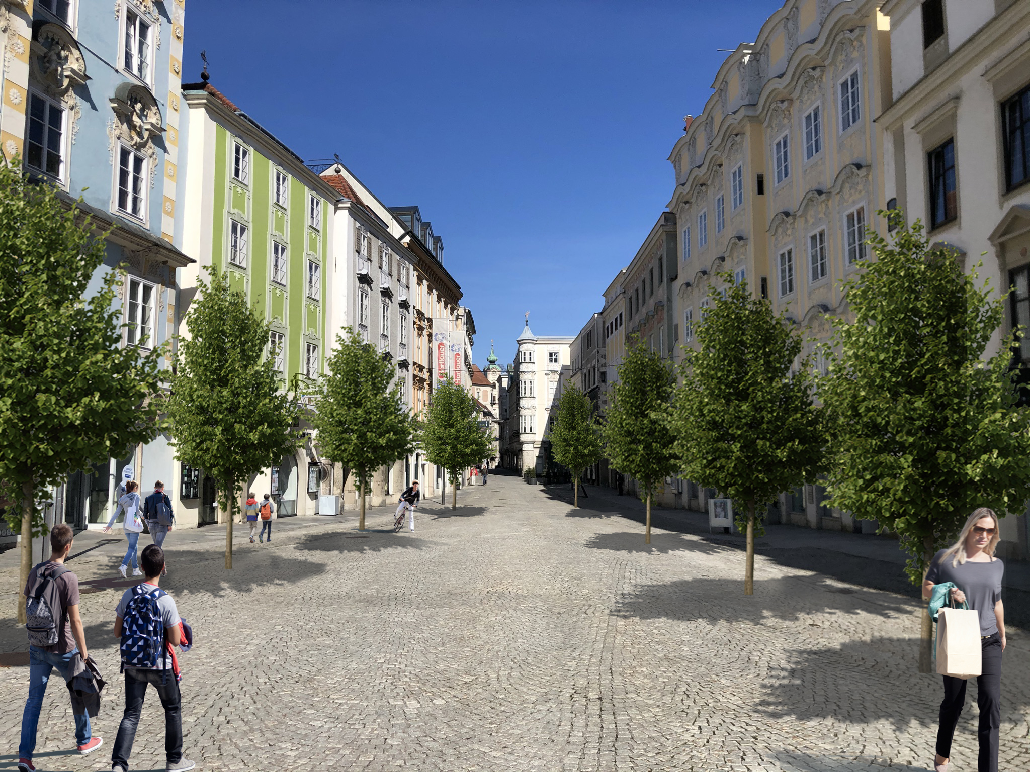 Ein autofreier urbaner Platz mit Bäumen.